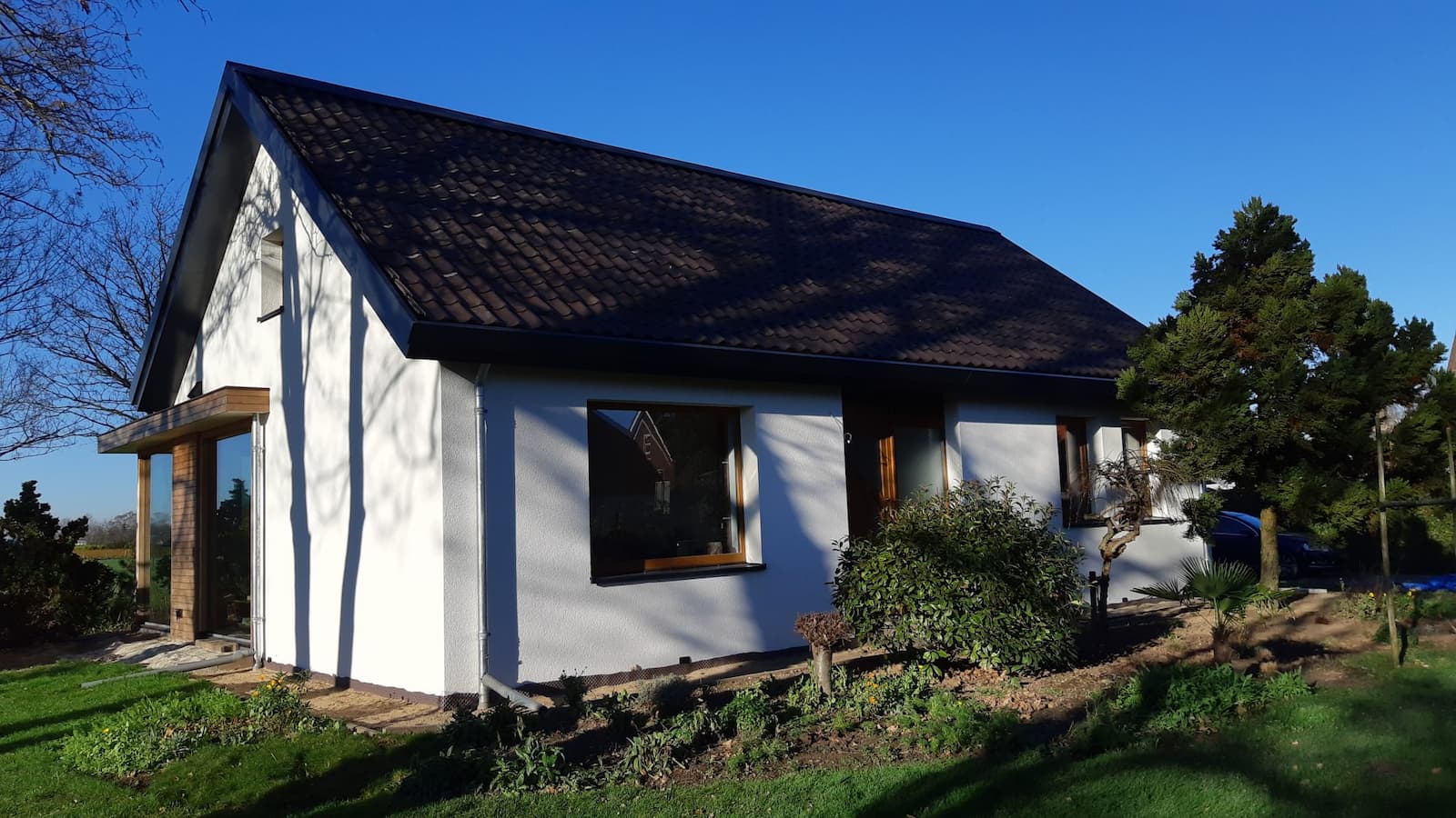 lbs63_schilrenovatie-50er-jaren-woning voorzijde rechts